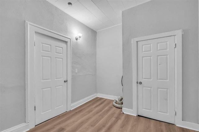 unfurnished room featuring light hardwood / wood-style flooring