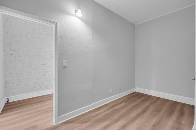 empty room featuring hardwood / wood-style floors