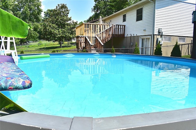 view of pool with a deck