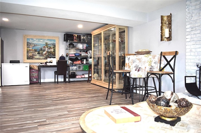 dining space featuring hardwood / wood-style flooring