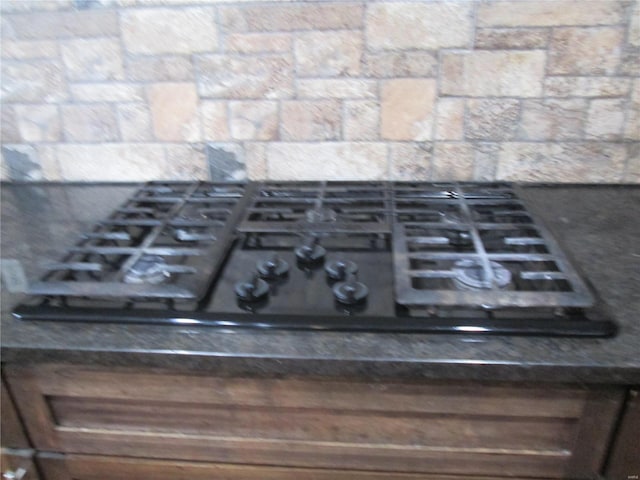 interior details featuring black gas stovetop