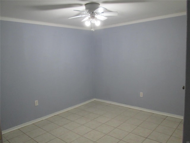 spare room featuring ornamental molding and ceiling fan