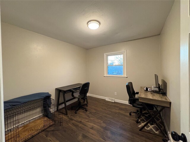 home office featuring dark hardwood / wood-style floors