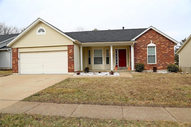 ranch-style home featuring a garage and a front yard