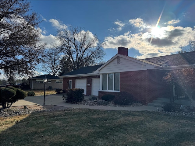 ranch-style home with a garage and a front yard