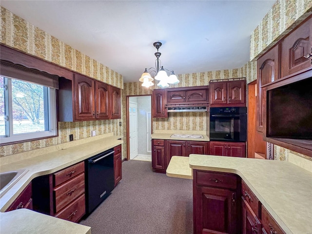 kitchen featuring hanging light fixtures, a notable chandelier, extractor fan, black appliances, and dark colored carpet