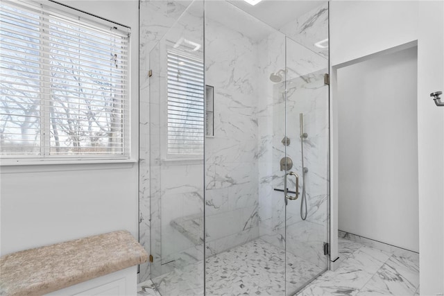 bathroom featuring an enclosed shower