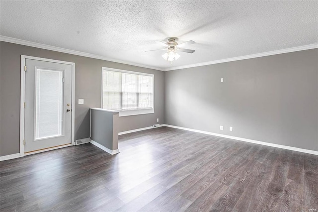 empty room with crown molding, ceiling fan, dark hardwood / wood-style flooring, and a textured ceiling