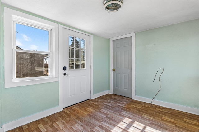 entryway with light hardwood / wood-style floors