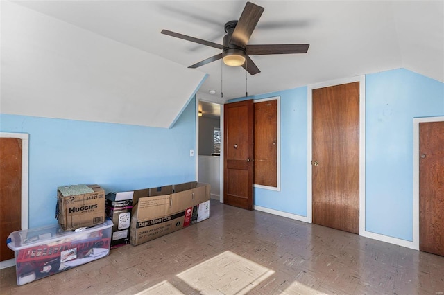 additional living space featuring vaulted ceiling and ceiling fan