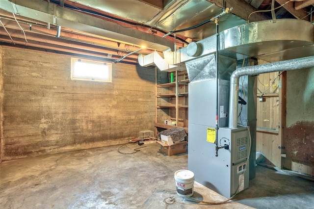 basement featuring heating unit