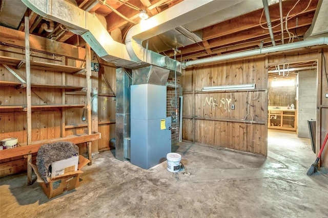 utility room with heating unit