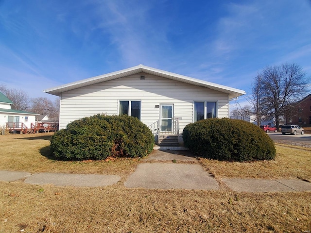 exterior space featuring a front lawn