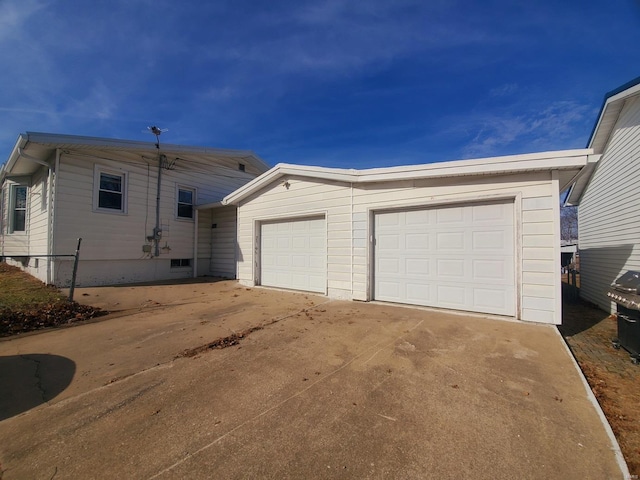 ranch-style house featuring a garage