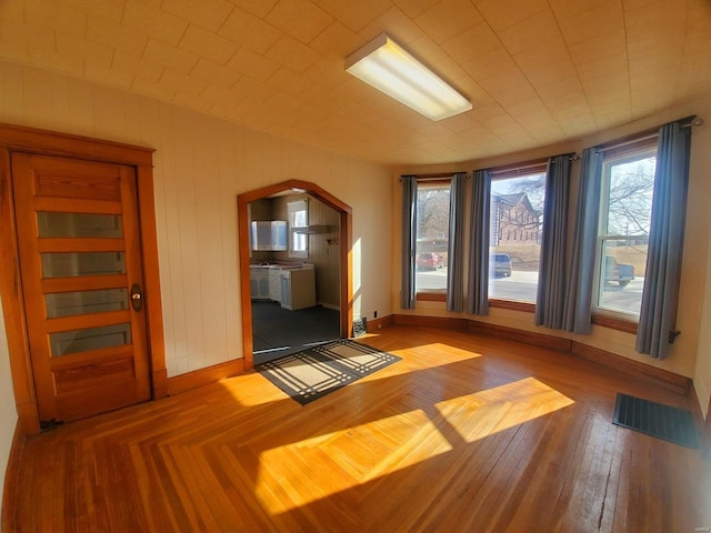 exercise area featuring hardwood / wood-style floors