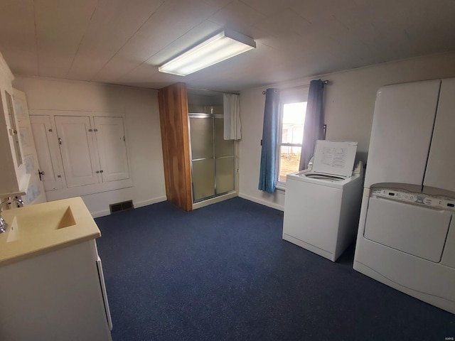 laundry room featuring washer and clothes dryer