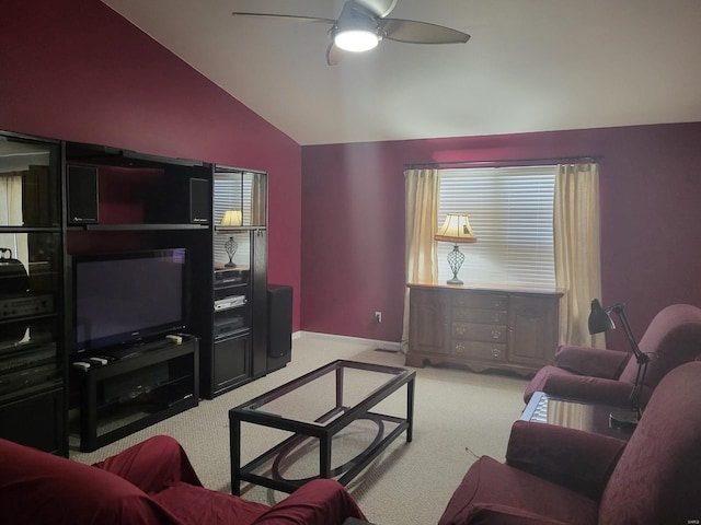 living room with vaulted ceiling, light colored carpet, and ceiling fan