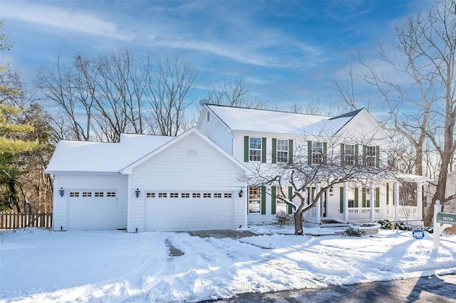 view of front of property featuring a porch and an attached garage