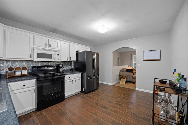 kitchen with decorative backsplash, dark hardwood / wood-style floors, white cabinets, and black appliances