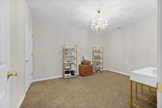 misc room featuring a chandelier and carpet