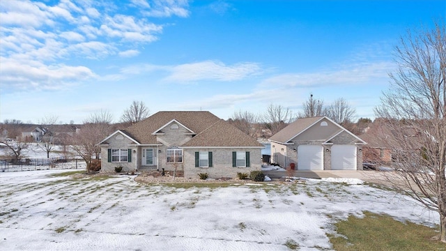 ranch-style home with a garage