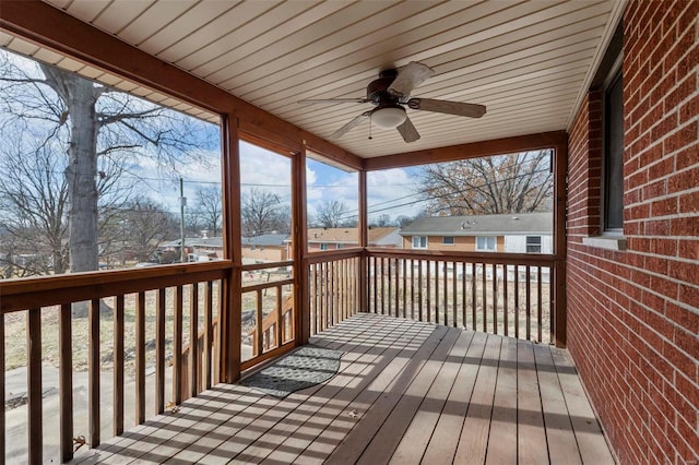 wooden deck with ceiling fan