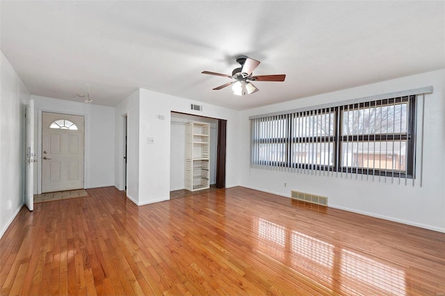 entryway featuring ceiling fan and light wood-type flooring