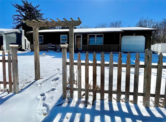 snow covered pool with fence