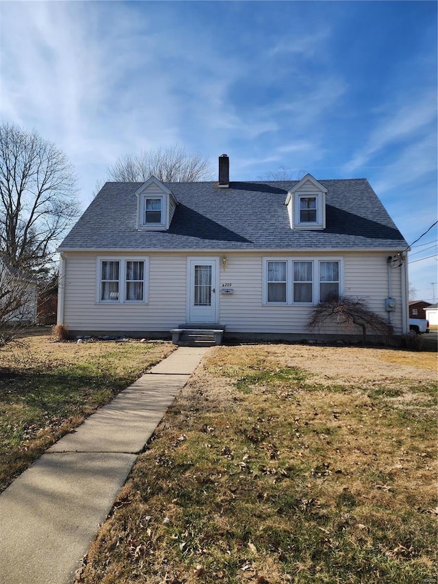 view of front of property with a front lawn