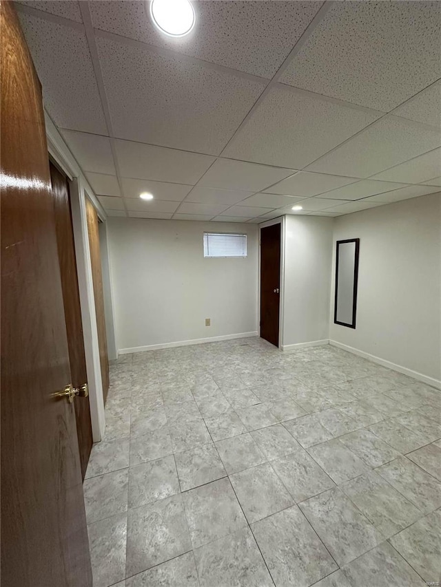 basement with a drop ceiling