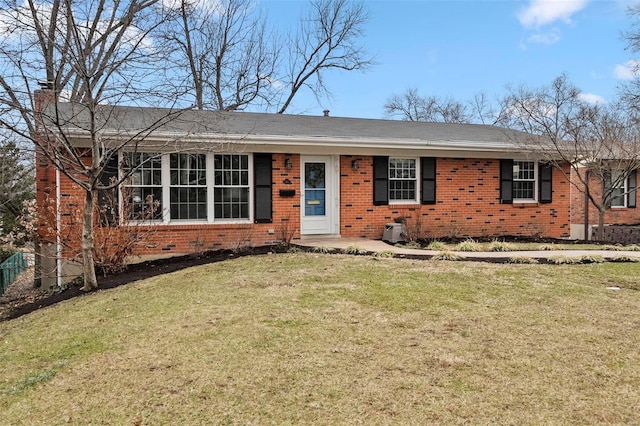 single story home with a front yard