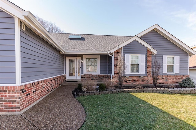 view of front of home featuring a front yard