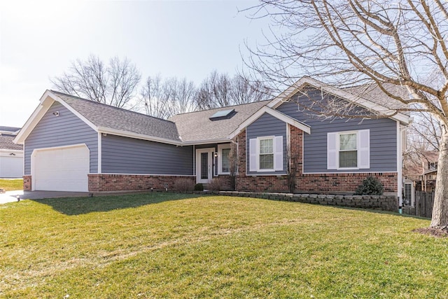 view of front of house featuring a garage and a front lawn