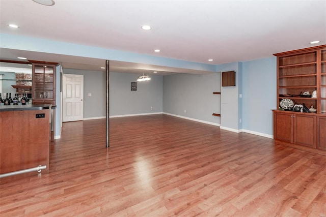 basement featuring wood-type flooring