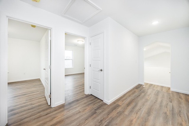 hallway featuring hardwood / wood-style flooring