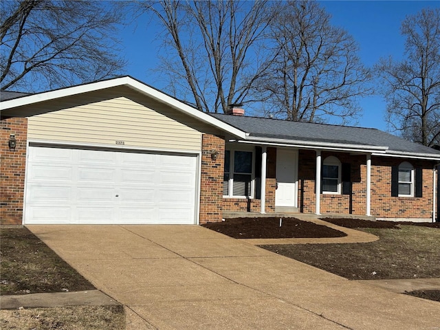 single story home with a garage and a porch