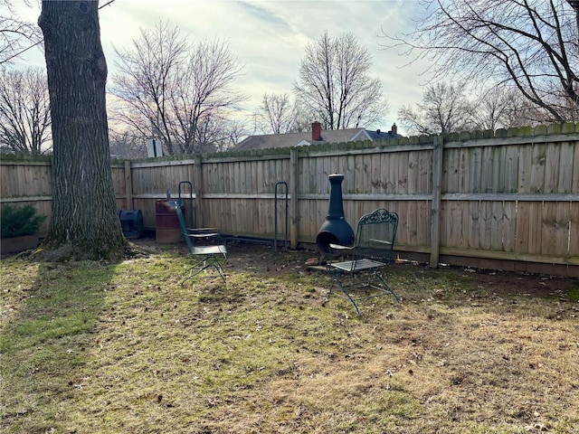 view of yard with a fenced backyard