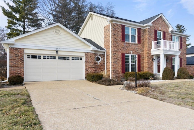 view of front of home with a balcony and a garage