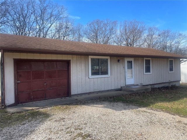 single story home featuring a garage