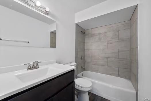 full bath with toilet, tub / shower combination, and vanity