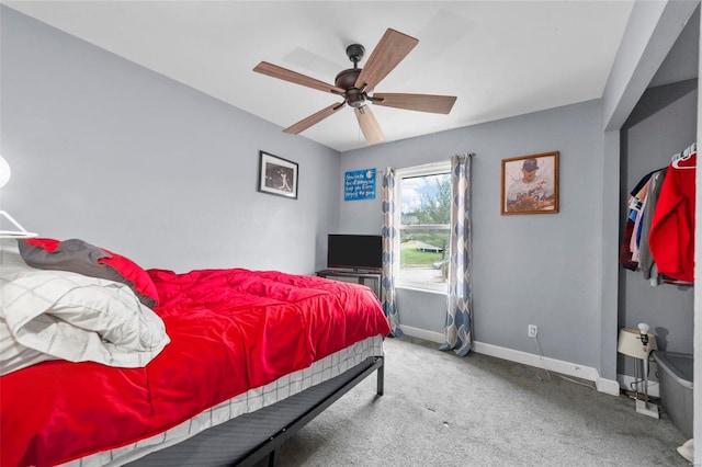 carpeted bedroom with ceiling fan