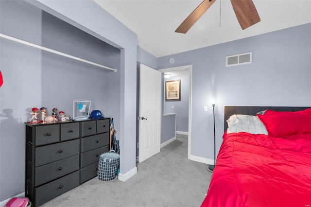 carpeted bedroom with ceiling fan