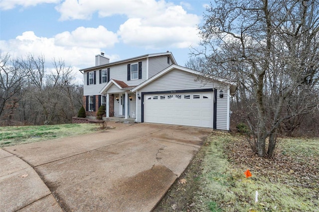 view of front of property featuring a garage