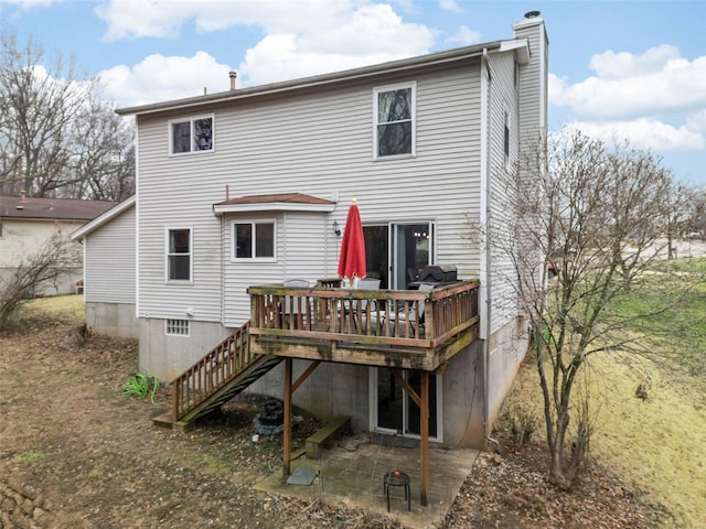 rear view of house with a deck