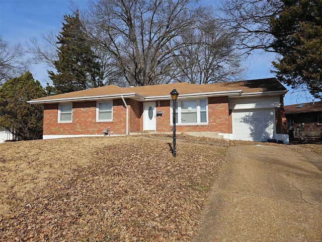 ranch-style house featuring a garage