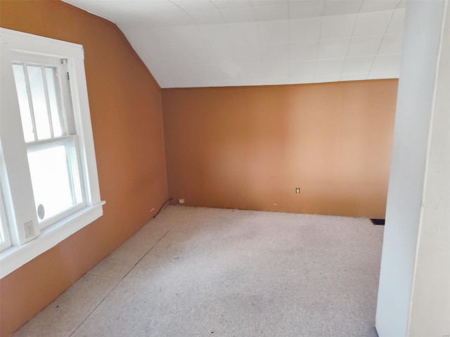 bonus room featuring vaulted ceiling