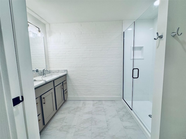 bathroom featuring vanity and an enclosed shower