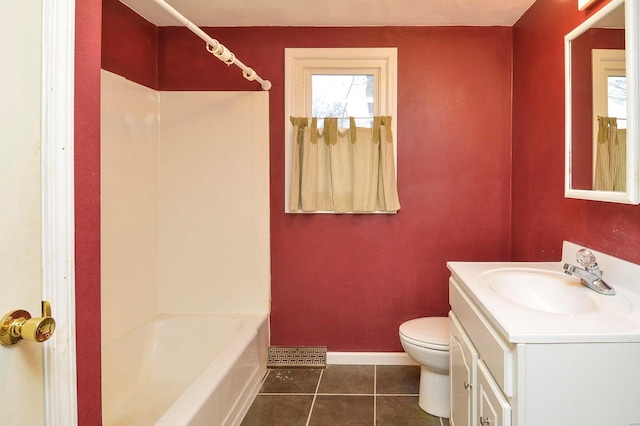 full bathroom with shower / tub combination, vanity, toilet, and tile patterned flooring