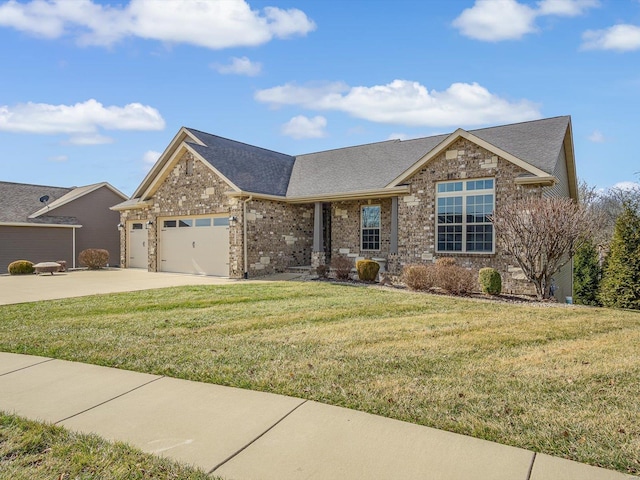 view of front of home featuring a garage and a front yard