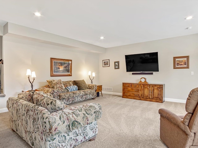 living room featuring light carpet